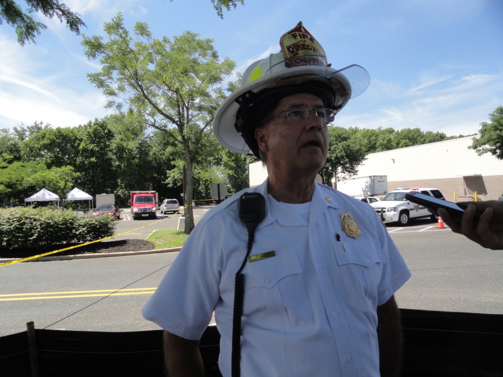 Cherry Hill Fire Director Patrick Kelly addresses media after a fatal accident at a construction site on Route 38. Credit: Matt Skoufalos.