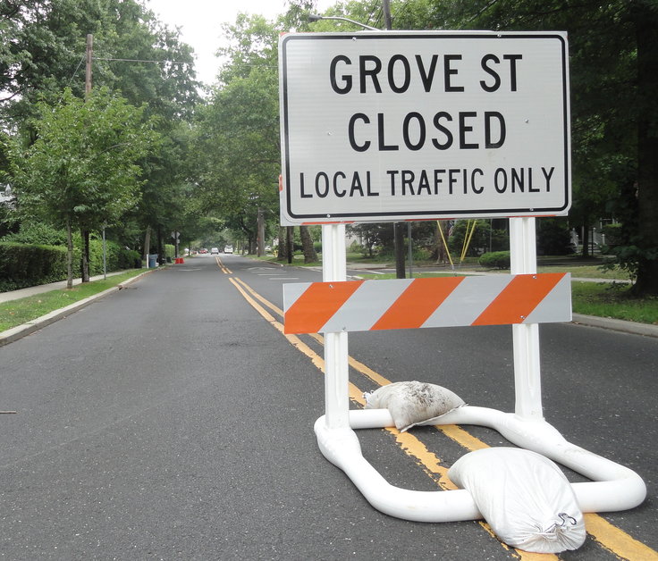 Signage alerts motorists that Maple Avenue is closed at Grove Street. Credit: Matt Skoufalos.