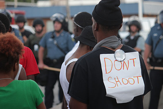 "Don't Shoot/Hands Up" has become the  the rallying cry of protesters nationwide over the death of Michael Brown of Ferguson, MO. Credit: Danny Wicentowski / Riverfront Times.