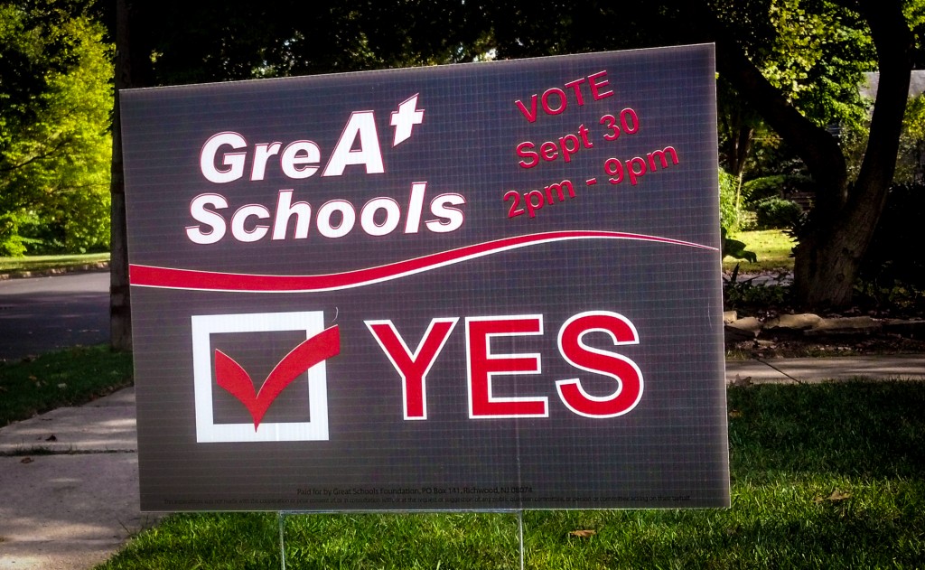 A sign encouraging voters to approve the Haddon Twp. bond referendum. Credit: Matt Skoufalos.