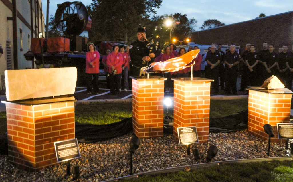 The sun descends on the 9-11 Memorial dedication in Westmont. Credit: Matt Skoufalos.