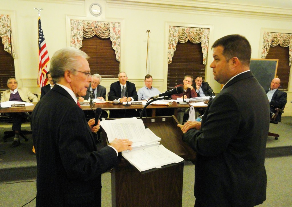 Donald Cofsky cross-examines civil engineer Robert Hunter at the Haddonfield planning board meeting Tuesday. Credit: Matt Skoufalos.