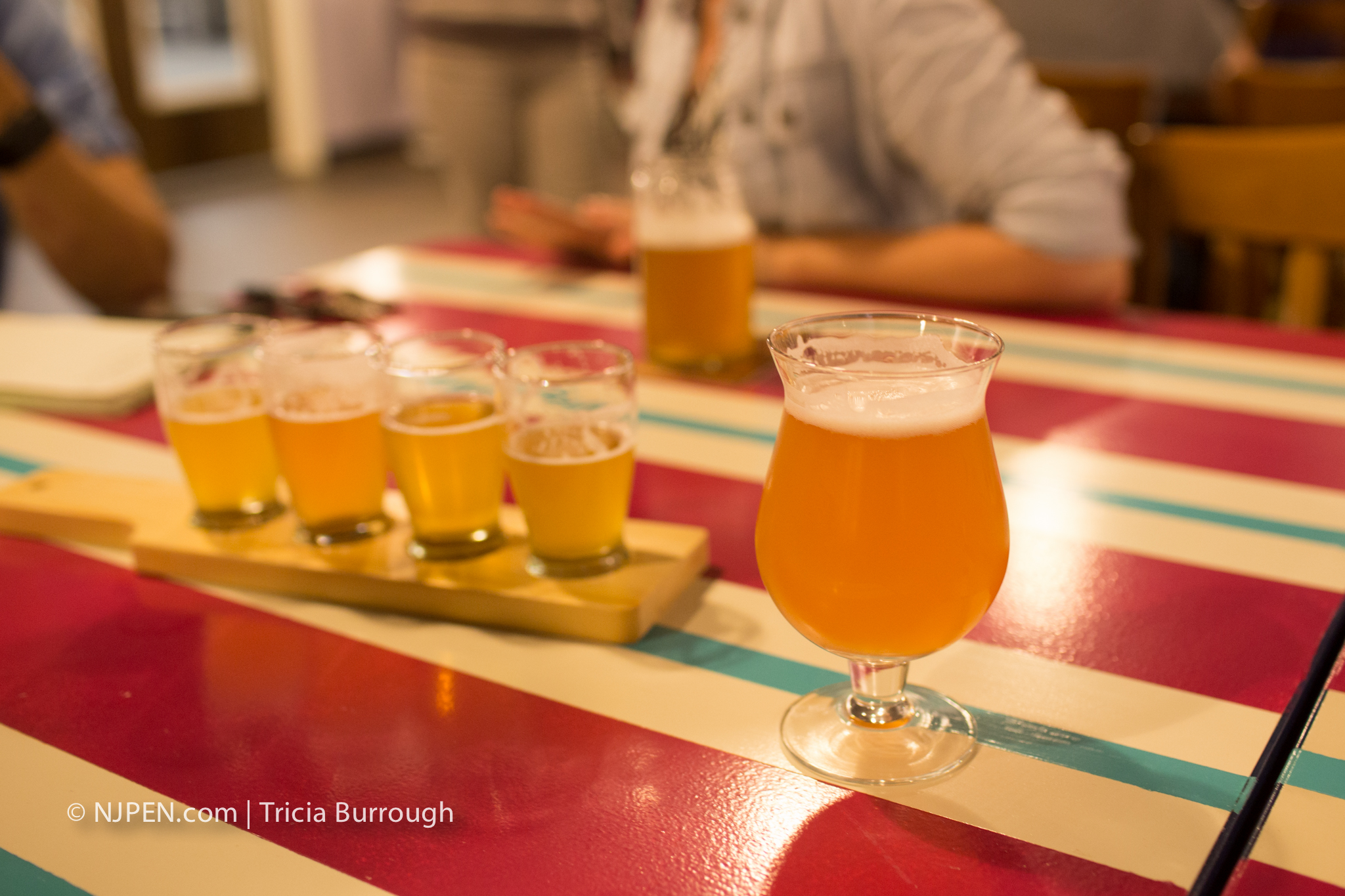 A flight of What the Butler Saw witbier-saison varietals, with a Funnel Cake cream ale. Credit: Tricia Burrough.