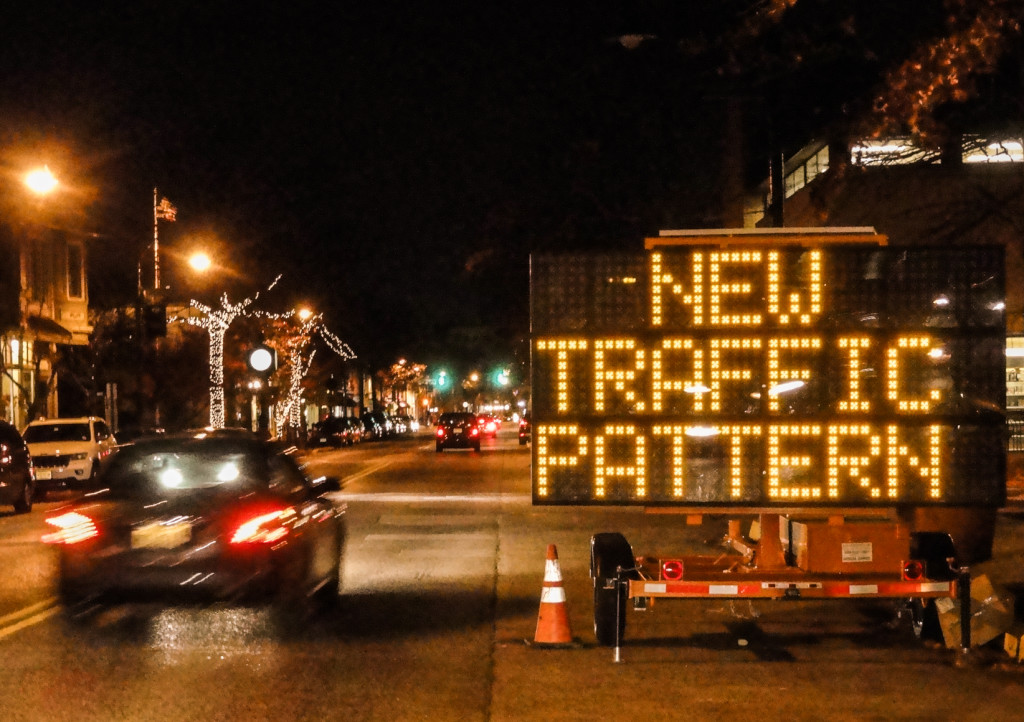 Traffic signs alert drivers to the new median. Credit: Matt Skoufalos.