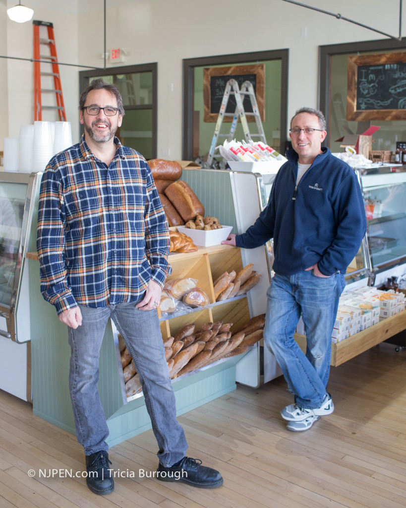 Chris Thomas (left) and Eli Massar celebrate the opening of Local Market. Credit: Tricia Burrough.