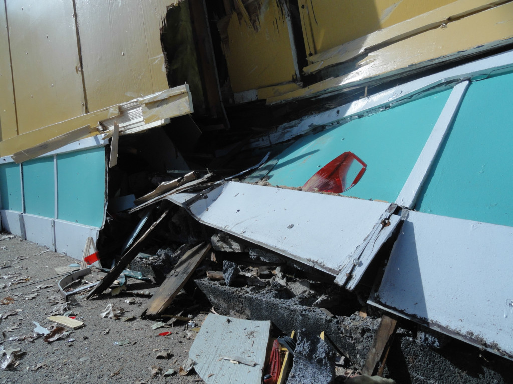 Closeup of the exterior damage to the bakery. Credit: Matt Skoufalos.