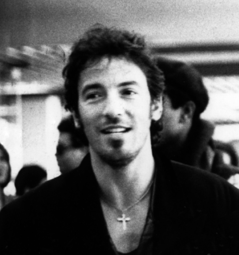 "Bruce Springsteen 1988" by Julien_civange_and_bruce_springsteen.jpg: Laura blandderivative work: Beao - Julien_civange_and_bruce_springsteen.jpg. https://goo.gl/YKuSqU.