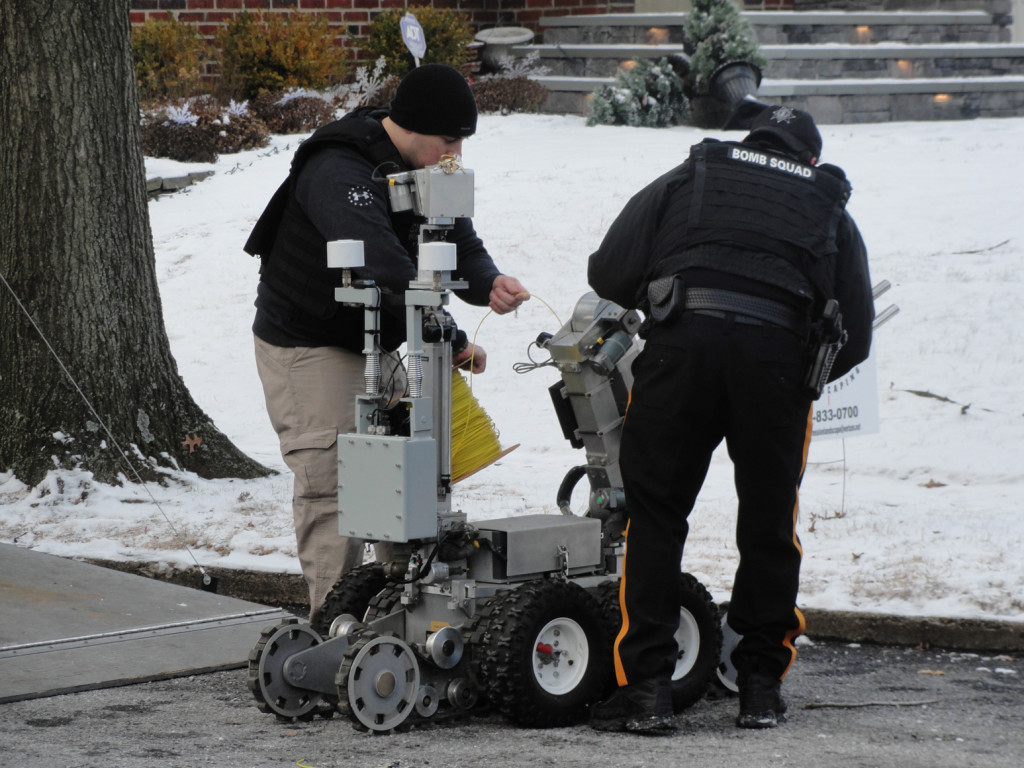 Police ready a tactical robot in a standoff in January 2015. Credit: Matt Skoufalos.