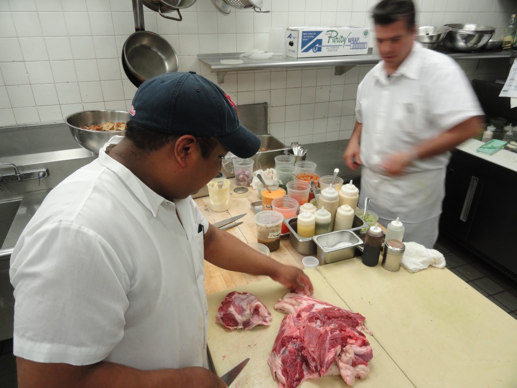 Fuller oversees food preparation. Credit: Matt Skoufalos.