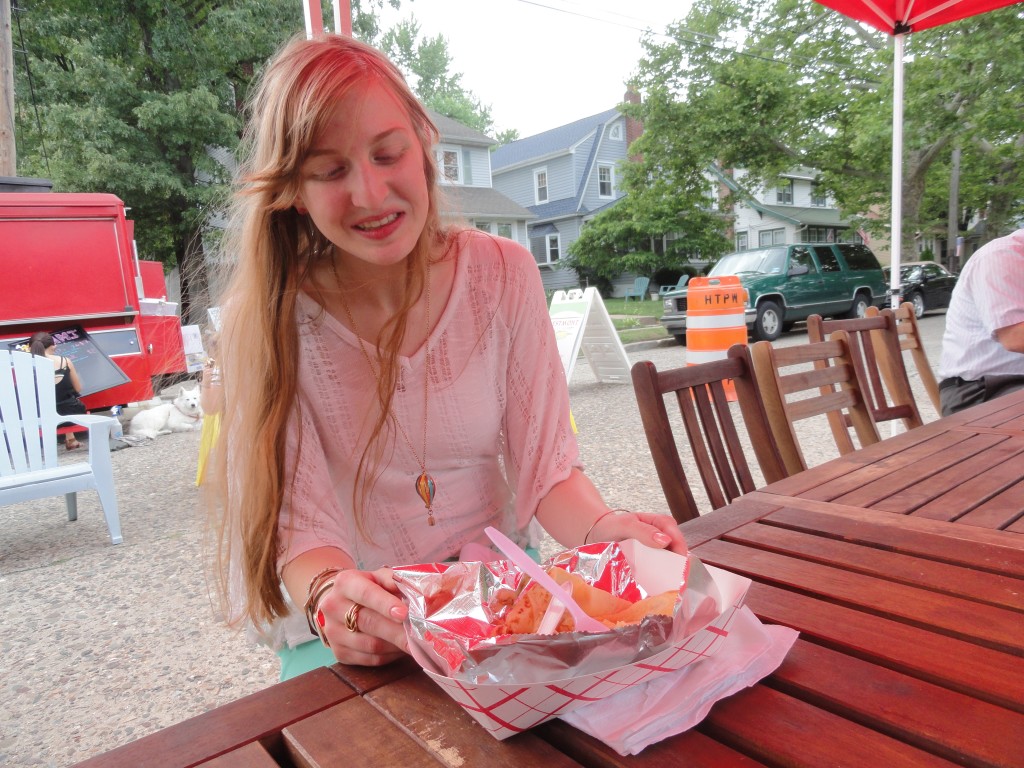 Fiona O'Sullivan of Deptford eats a crepe. Credit: Matt Skoufalos.