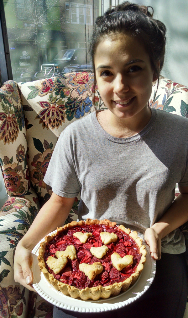Natalie Moody shows off a vegan strawberry rhubarb pie at Heart Beet Cafe. Credit: Matt Skoufalos.