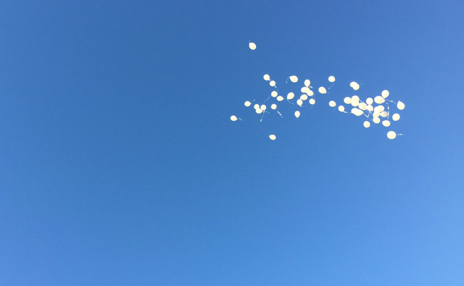 Balloons released in honor of the 49 victims of the Orlando nightclub shooting. Credit: Abby Schreiber.