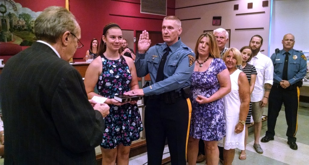 Haddon Heights Solicitor Albert Olizi swears in Bruce Koch as police chief. Credit: Matt Skoufalos.