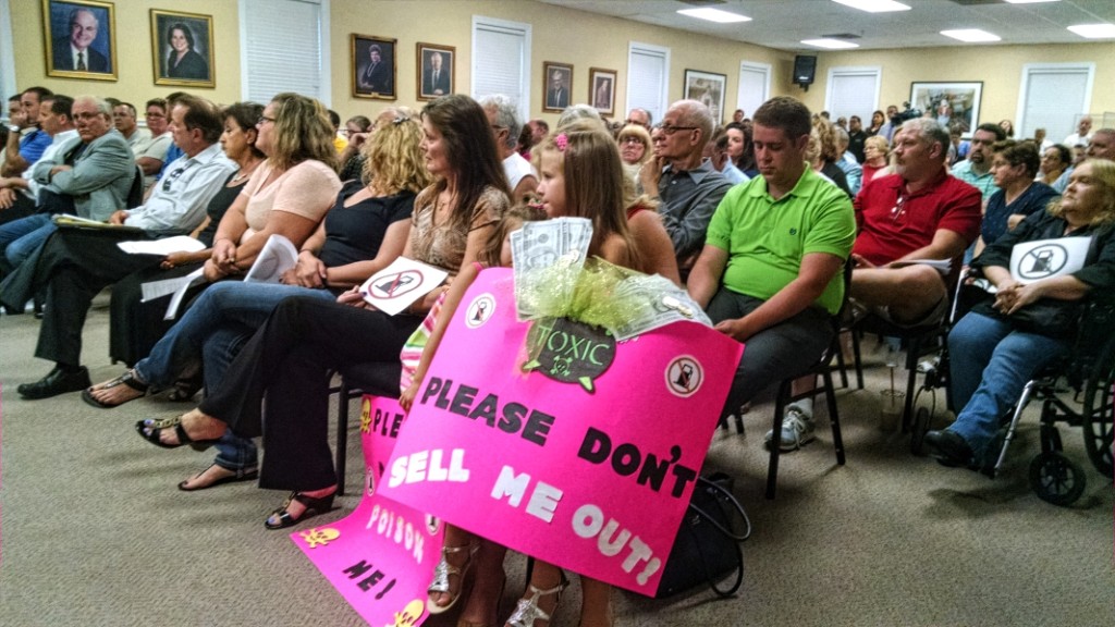 Residents protest a zoning change at a Cherry Hill Council meeting. Credit: Matt Skoufalos.