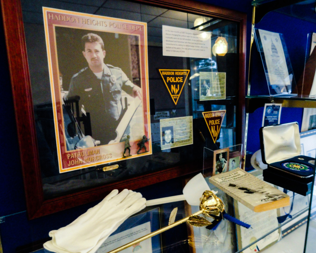 A memorial to fallen officer John Norcross is maintained in the Haddon Heights Municipal Building. Credit: Matt Skoufalos.