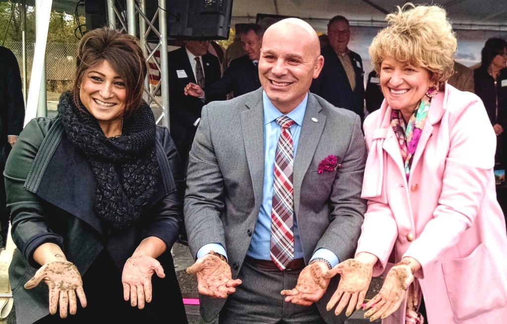 Bancroft CEO Toni Pergolin (right) casts her hands in cement with Burlington County Freeholder Kate Gibbs (left) and Bancroft Sr. VP Dennis Morgan. Credit: Matt Skoufalos.